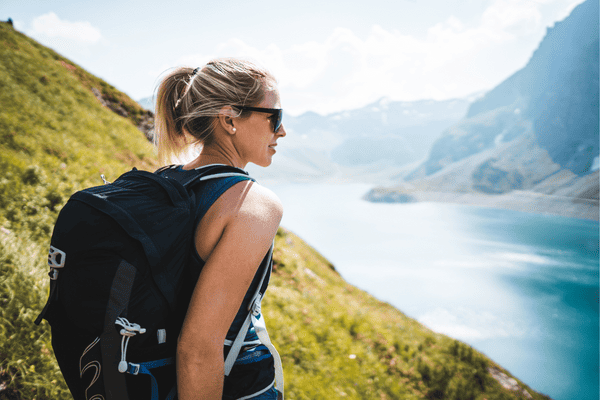 Photo of a woman hiking.