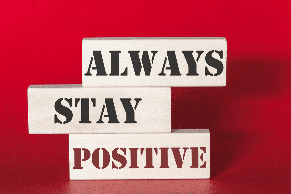 ''Always Stay Positive'' written against a red background