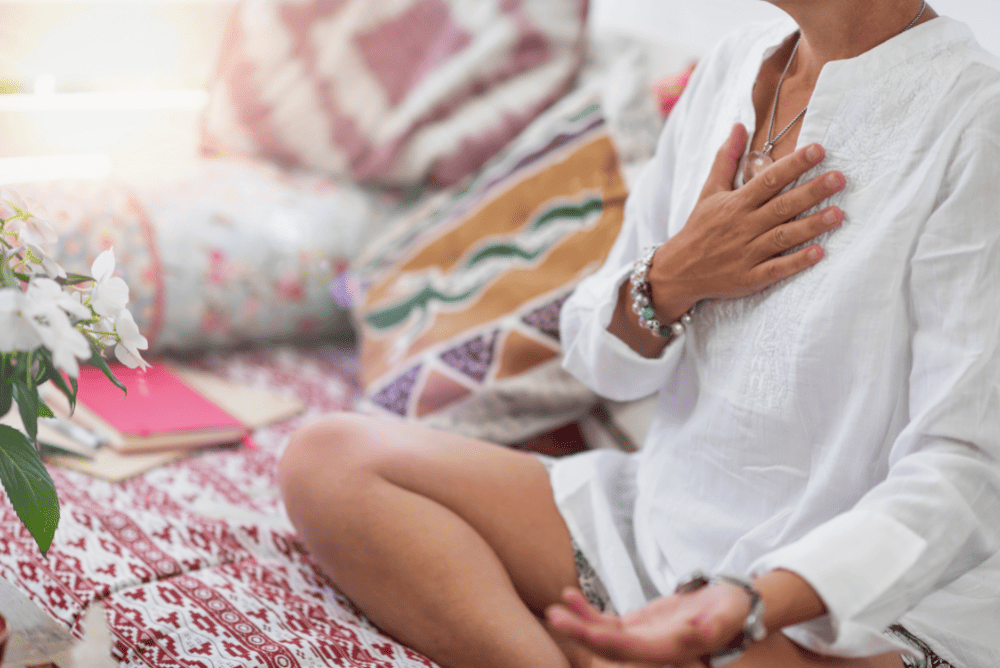 A woman practising Spirituality  Self-Care.