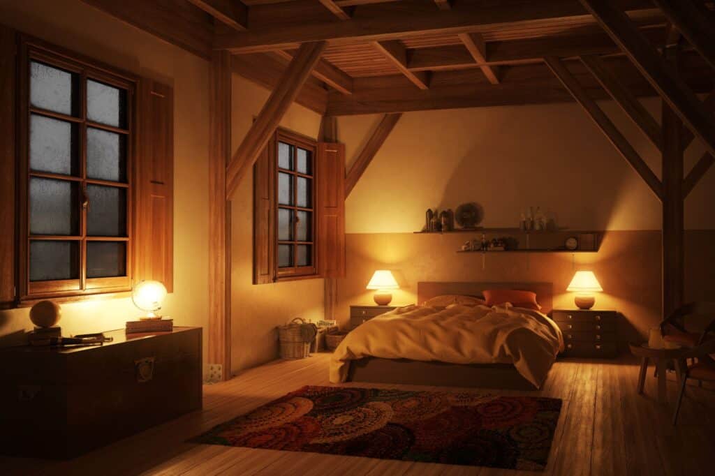 A cozy bedroom with wooden beams, a bed, and two nightstands with lamps invites mindful self-care. A colorful rug and two windows enhance the serene space, while warm lighting creates a relaxed atmosphere perfect for unwinding.