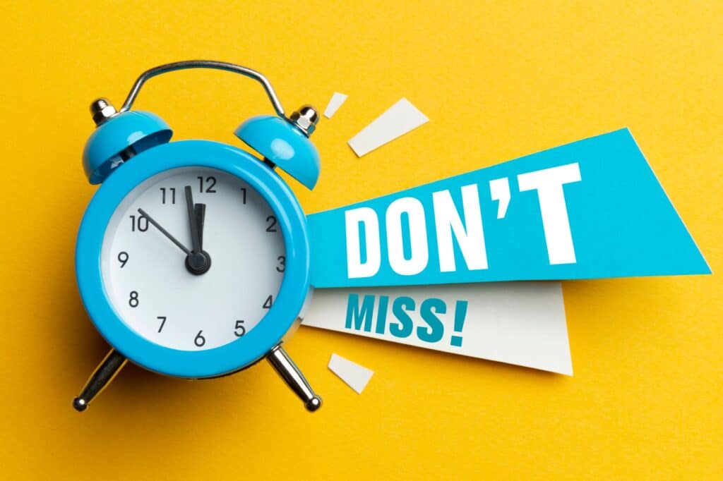 A blue alarm clock on a yellow background with the words "DON'T MISS!" in bold blue and white text.